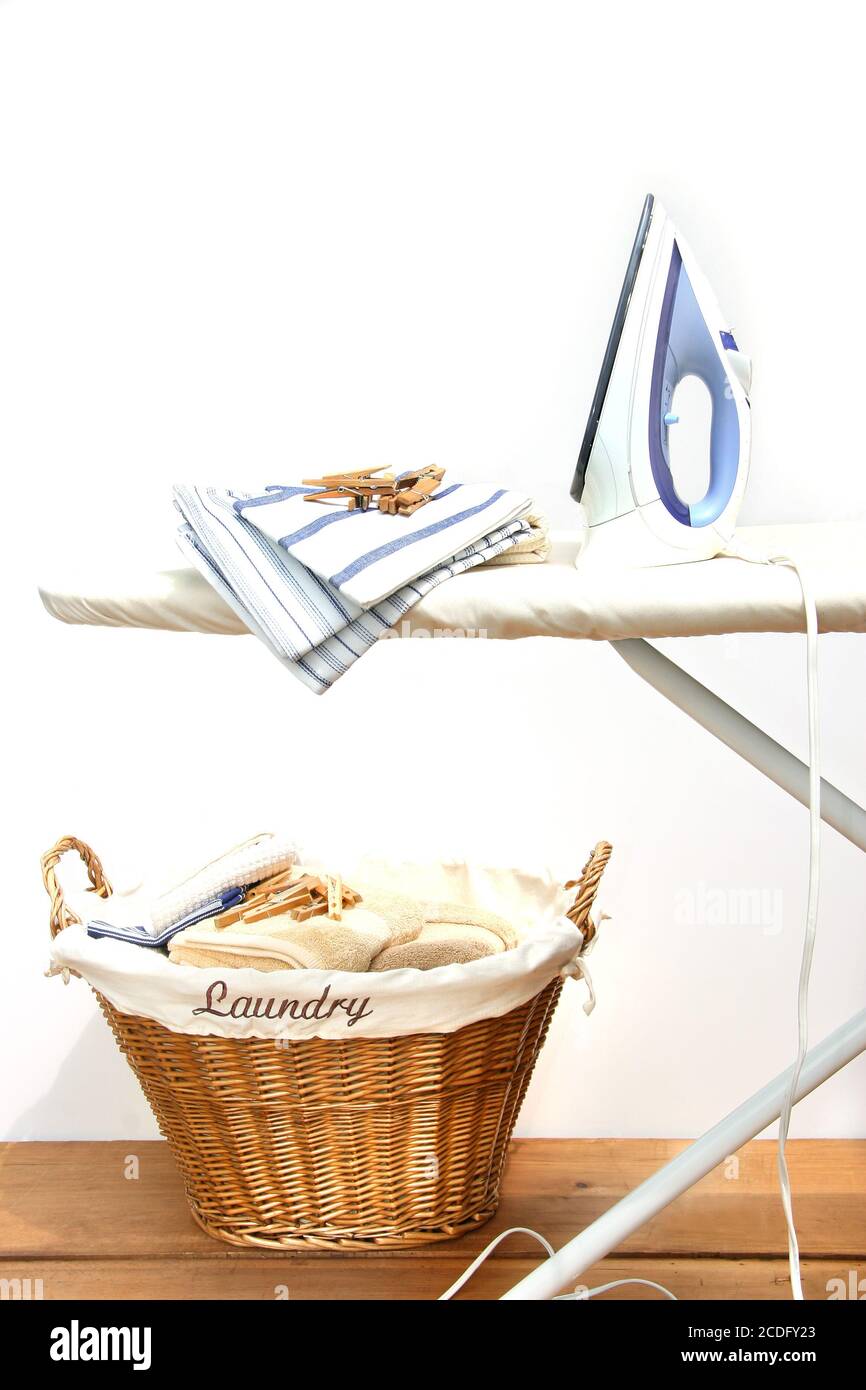 Ironing board with laundry Stock Photo Alamy