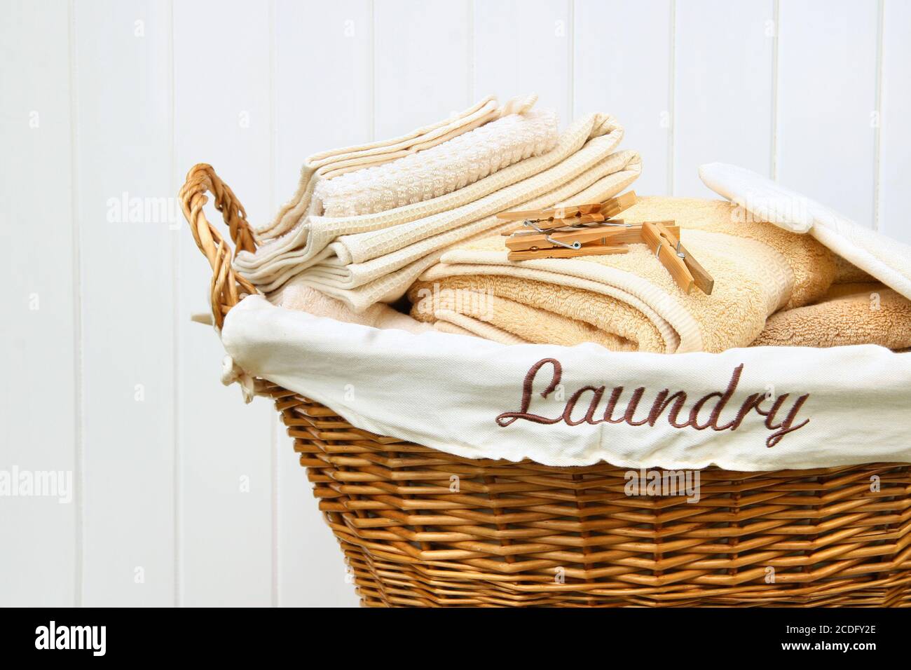 Clean towels in wicker basket Stock Photo Alamy