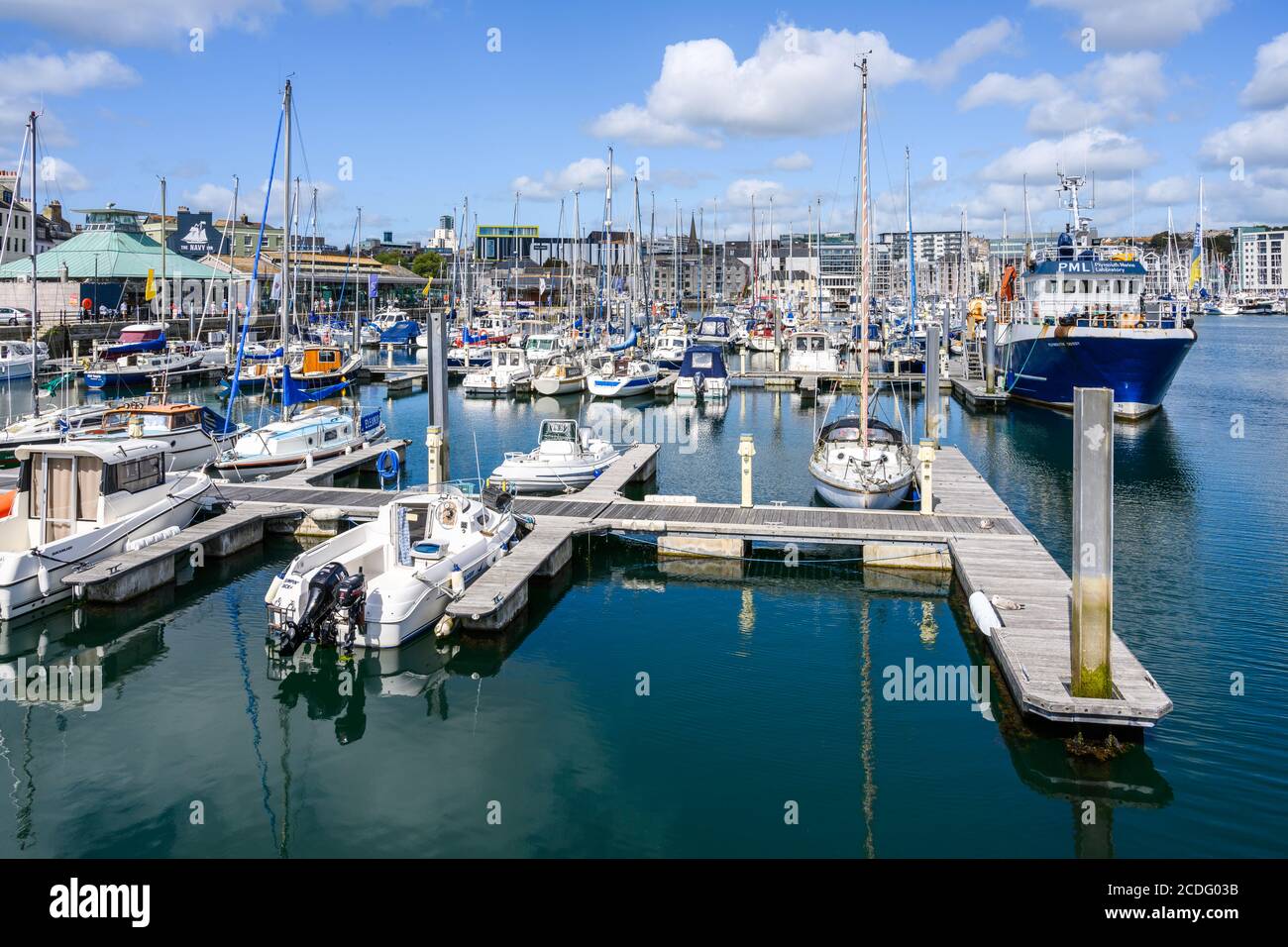 Sutton Harbour Marina provides serviced berthing in the sheltered Sutton Harbour, Plymouth, Devon, UK. Stock Photo