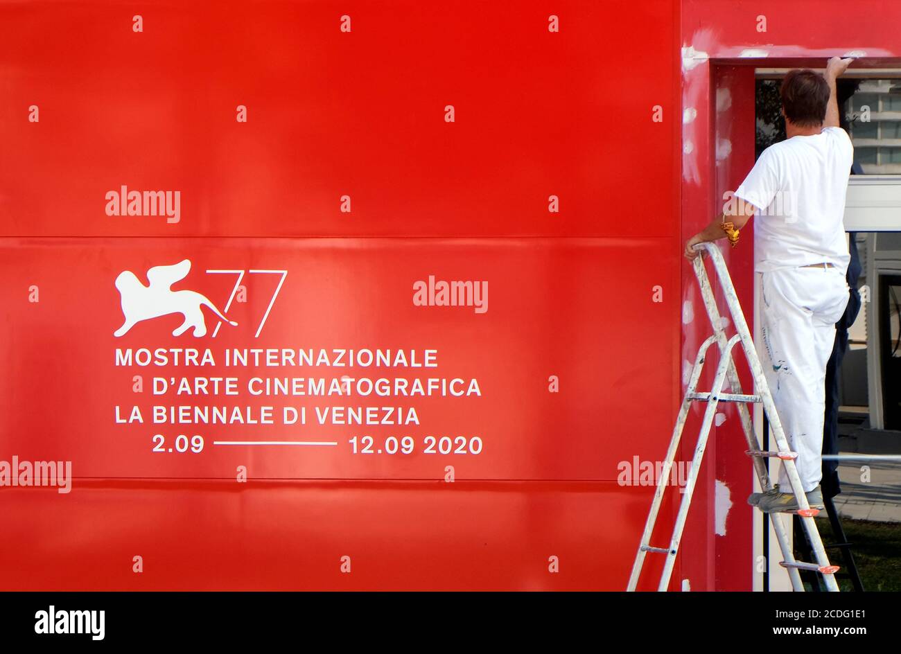A worker prepares for the 77th Venice Film Festival, the first major international film festival held since the coronavirus disease (COVID-19) outbreak, in Venice, Italy August 28, 2020. REUTERS/Manuel Silvestri Stock Photo