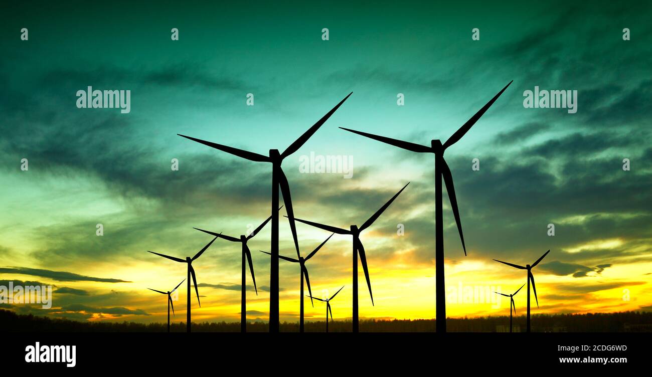 Wind turbines silhouette at sunset Stock Photo - Alamy