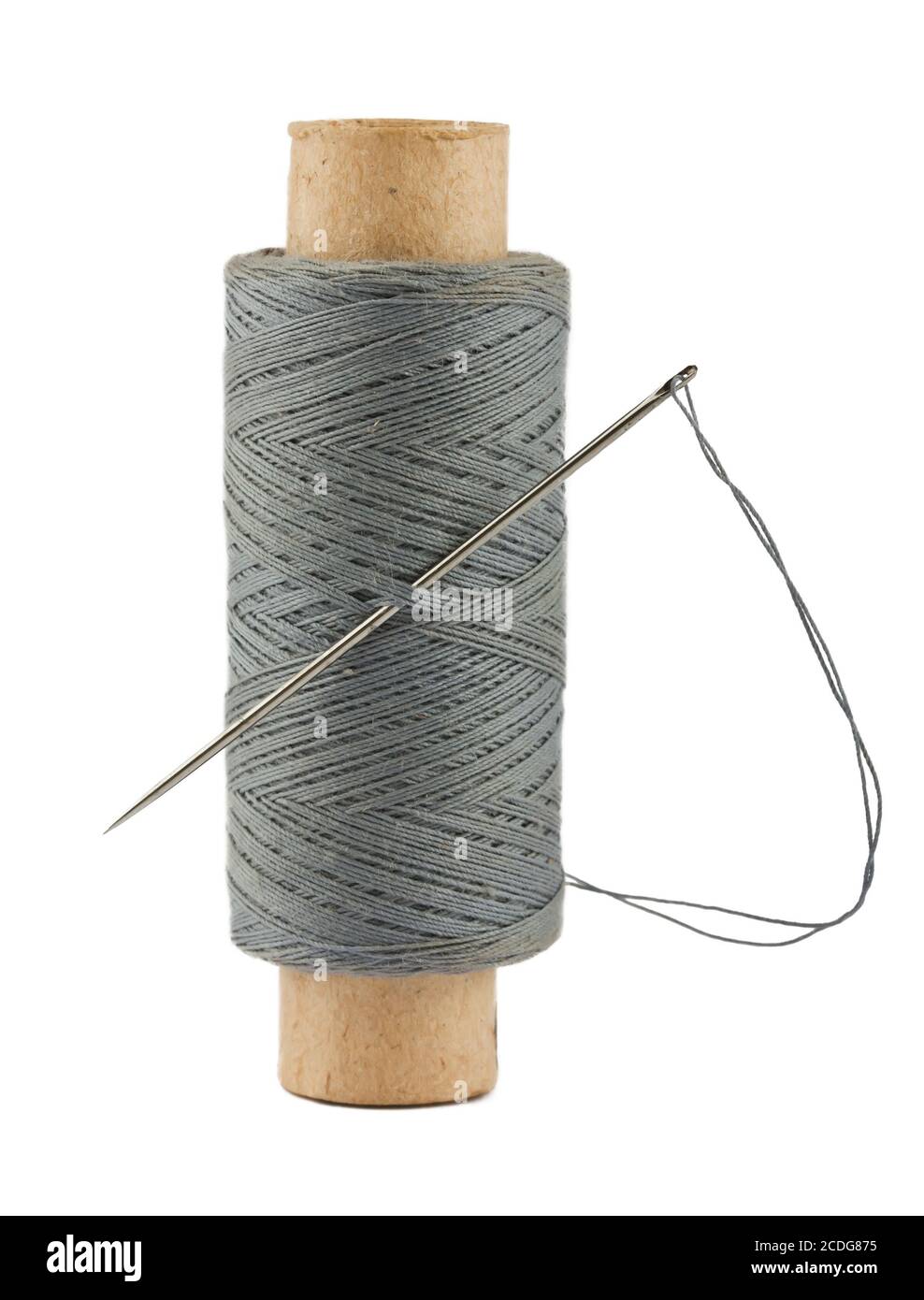 spool of thread and needle Stock Photo