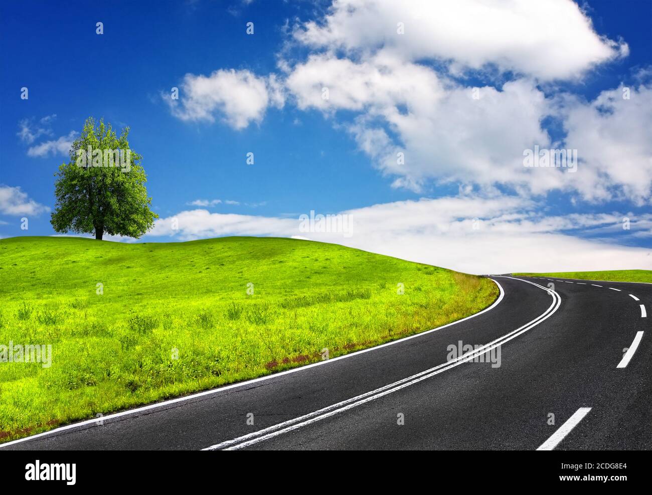 Road and cloudy sky Stock Photo - Alamy