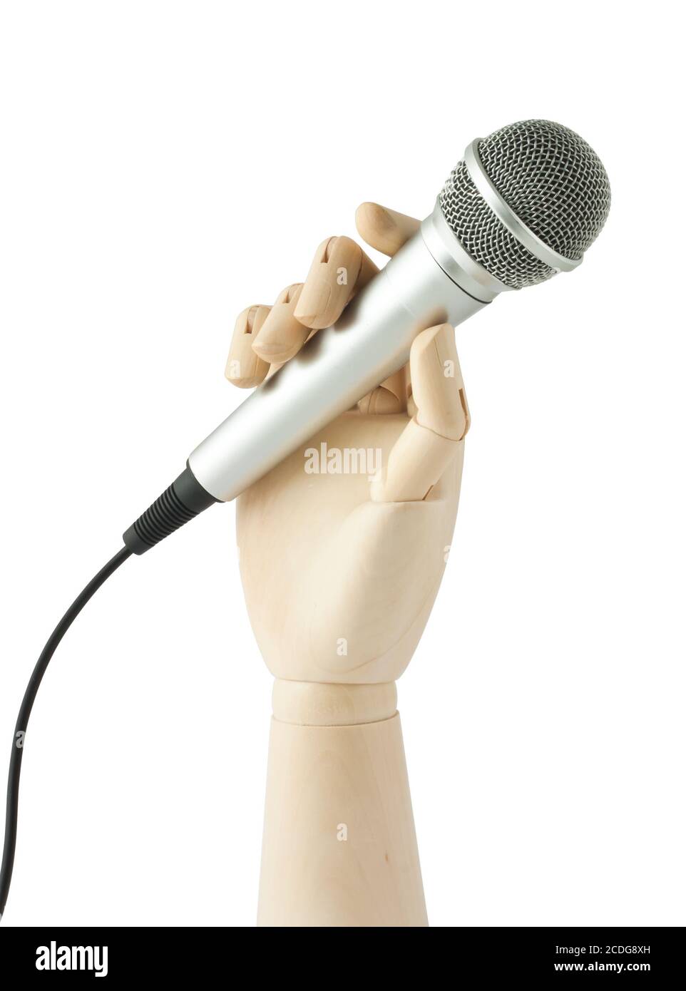 wooden hand holding a microphone Stock Photo