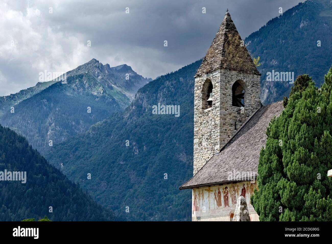 The church of San Vigilio in Pinzolo with the Macabre Dance fresco by the painter Simone II Baschenis. Rendena Valley, Trentino, Italy. Stock Photo