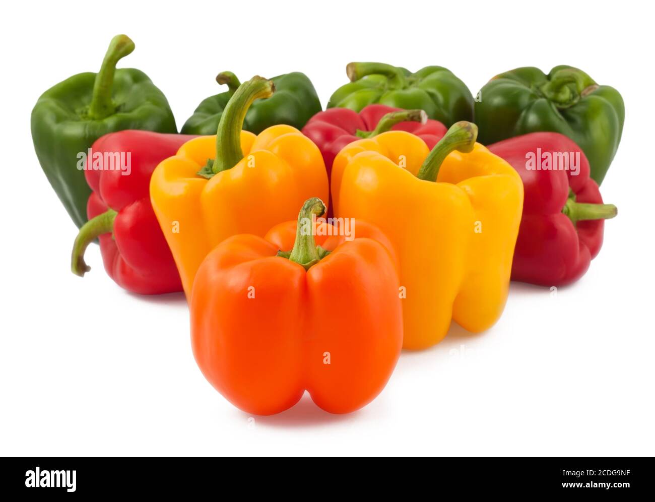 Green, yellow, orange and red peppers Stock Photo