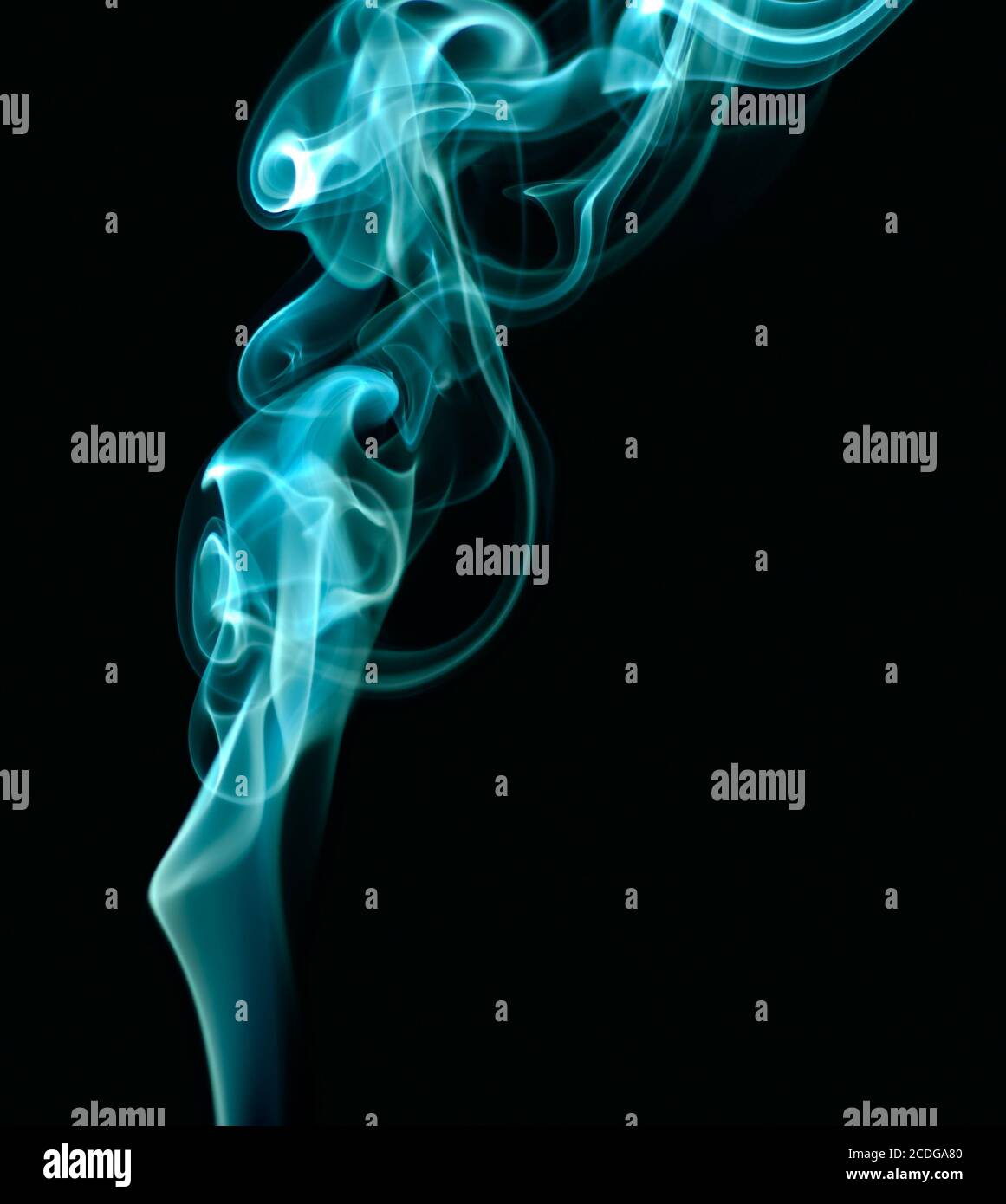 Stream of a blue smoke on a black background Stock Photo