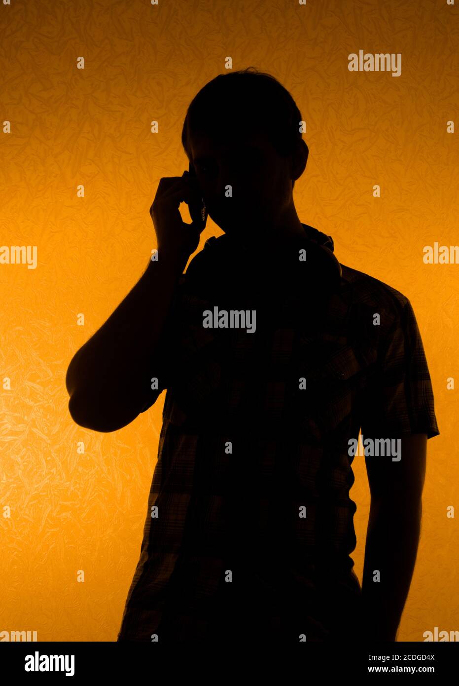 Silhouette of man speak over the phone Stock Photo