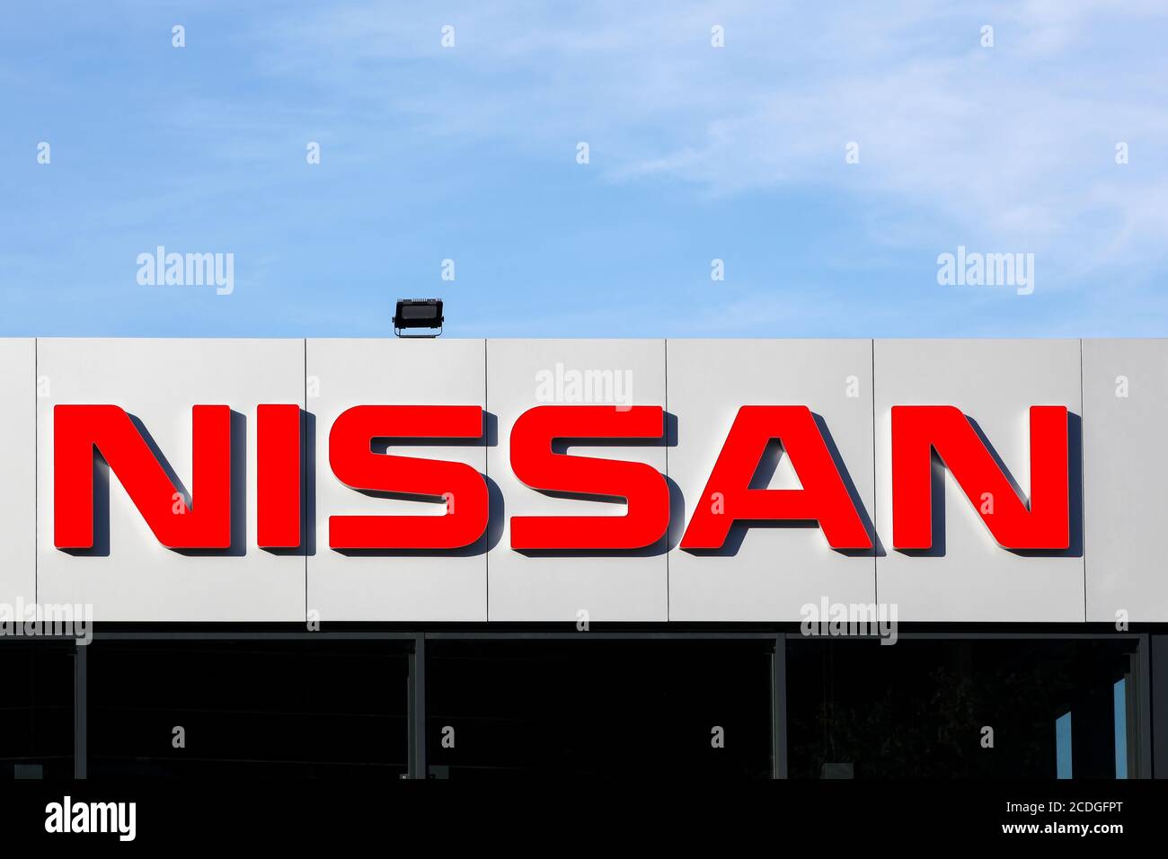 Grenoble, France - June 16, 2019: Nissan sign on a facade. Nissan Motor Company Ltd, is a Japanese multinational automobile manufacturer Stock Photo