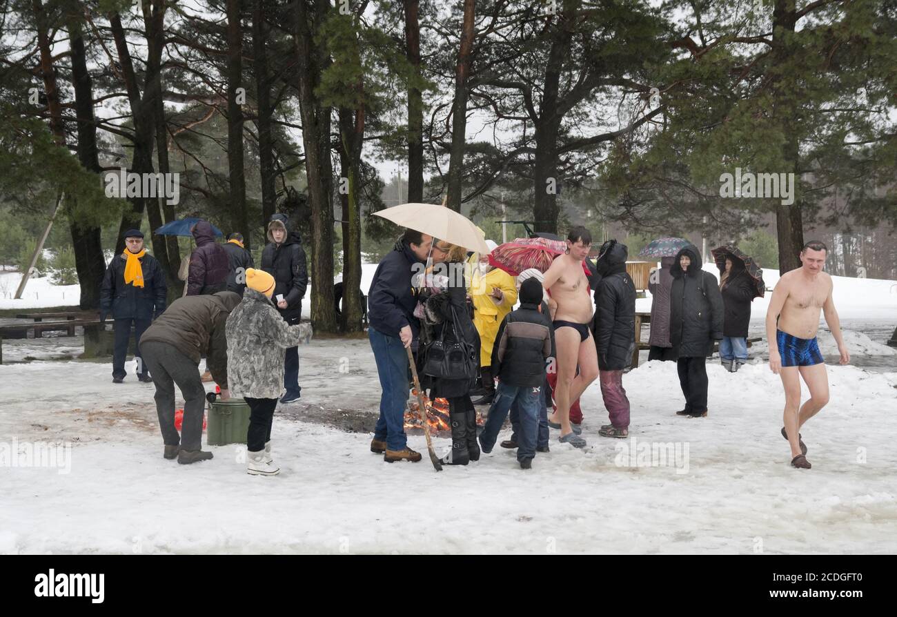 VILNIUS, LITHUANIA – FEBRUARY 5: Fans of winter swimming take a bath in some ice water on February 5, 2011 in Vilnius, Lithuan Stock Photo