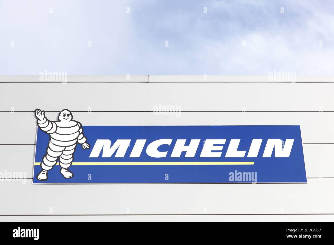 Macon, France - January 30, 2016: Michelin logo on a wall. Michelin is a tire manufacturer based in Clermont-Ferrand in France Stock Photo