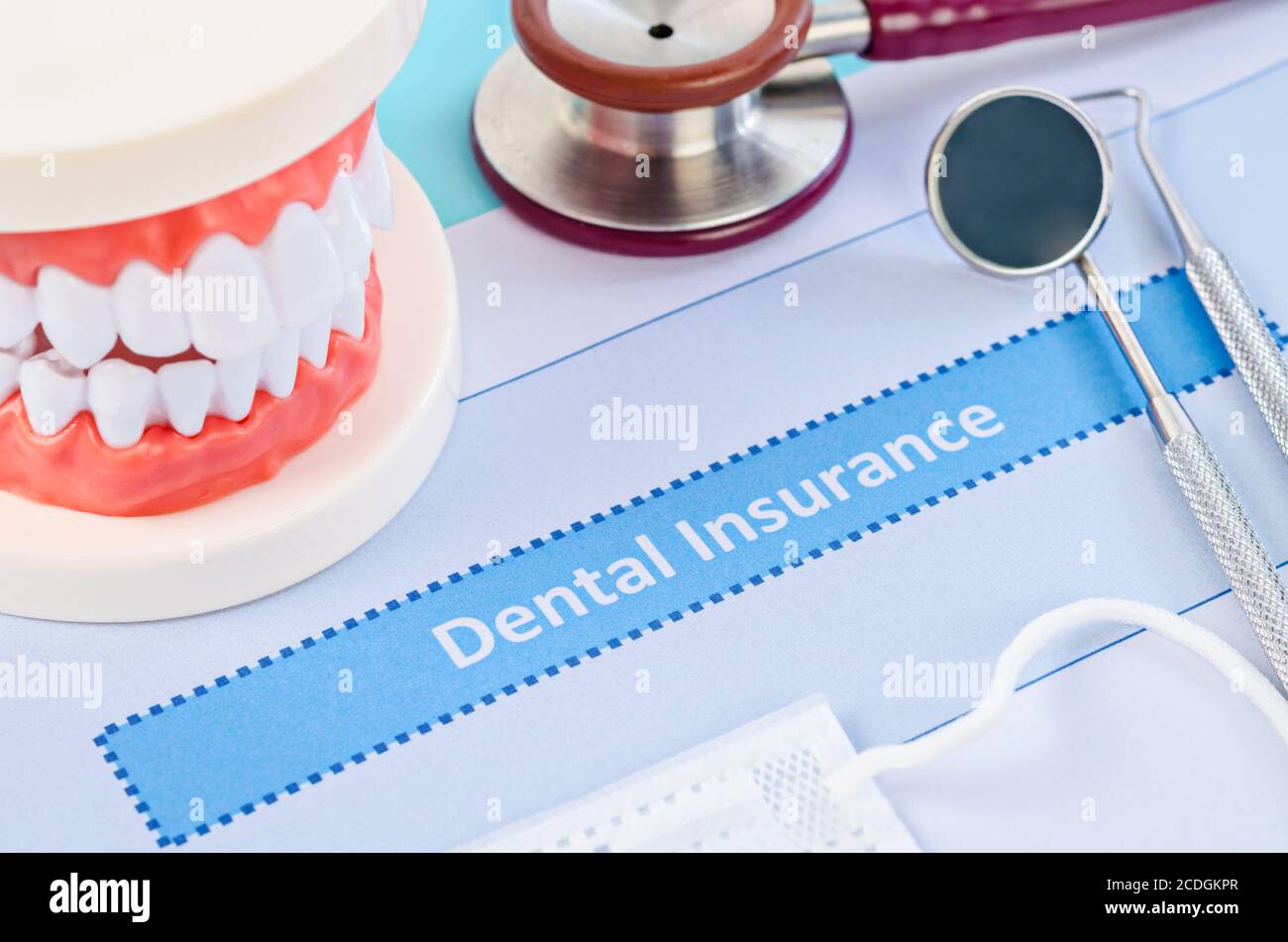 Dental insurance with dental equipment. Dental concept Stock Photo Alamy