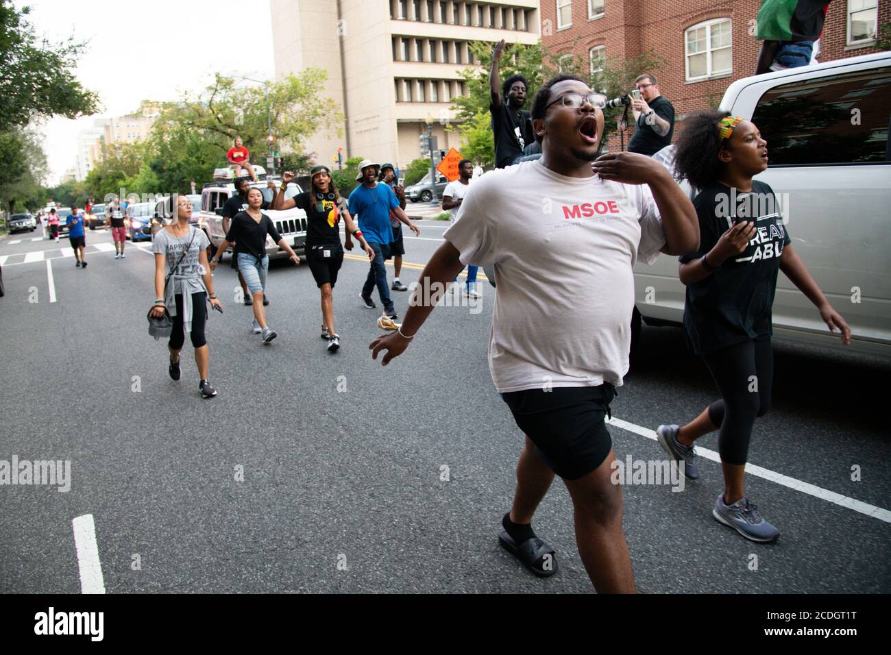 A protest march organized by activist Frank Nitty that started in Milwaukee arrives in Washington after more than 700 miles of walking before the beginning of civil rights march organized by Al Sharpton to call attention to systemic racism and police violence after the May police killing of George Floyd in Minnesota, in Washington, D.C., on August 28, 2020, amid the coronavirus pandemic. The night before The Commitment March: Get Your Knee Off Our Necks, protests consumed the blocks surrounding the White House, as President Trump gave his presidential nomination acceptance speech with sounds f Stock Photo