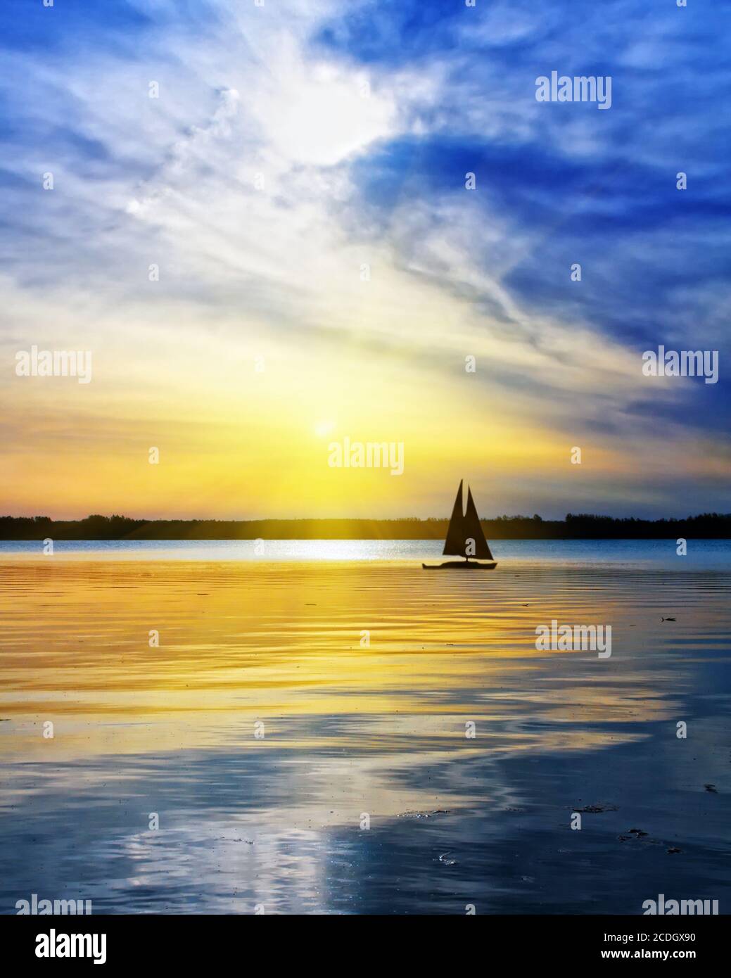 Sailing against the sunset Stock Photo - Alamy