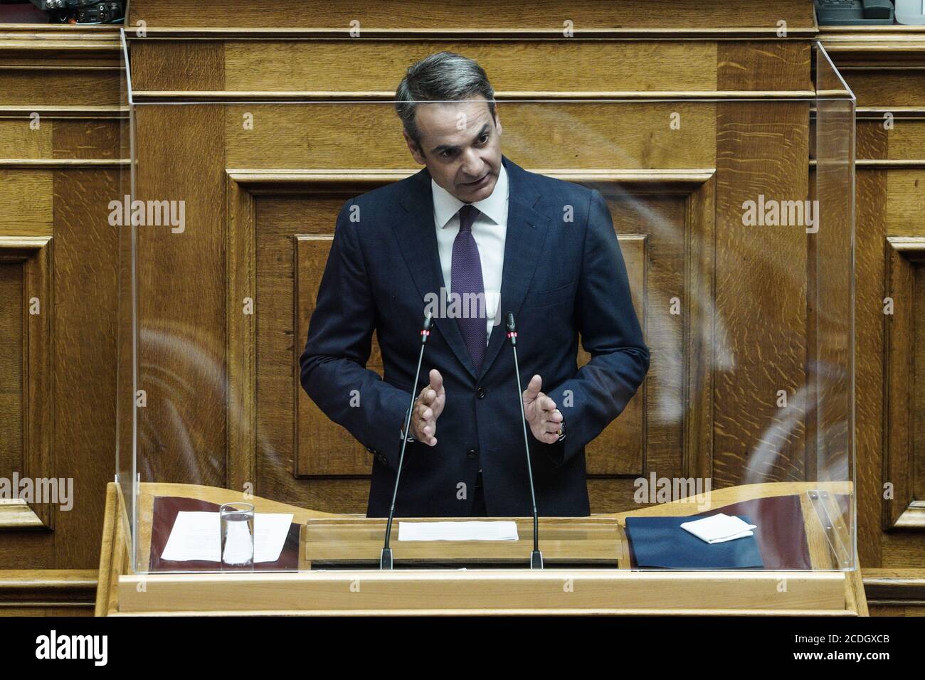 Athens, Greece. 26th Aug, 2020. Greek Prime Minister Kyriakos Mitsotakis addresses the parliament in Athens, Greece, on Aug. 26, 2020. TO GO WITH 'Greek parliament ratifies agreements for delimitation of EEZ with Egypt and Italy' Credit: Nick Paleologos/Xinhua/Alamy Live News Stock Photo