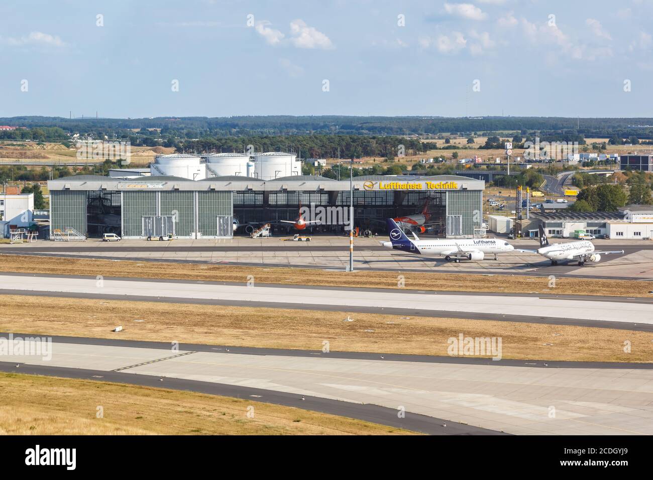 Berlin, Germany - August 19, 2020: Lufthansa Technik Hangar airplanes Berlin Brandenburg BER airport aerial view photo in Germany. Stock Photo