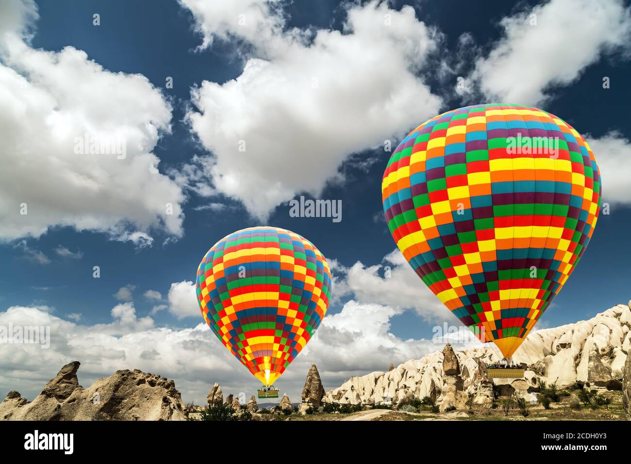 Colorful Striped Hot Air Balloon Flights tours Kapadokya Balloons tourism  tourist attraction of Cappadocia Turkey Stock Photo - Alamy