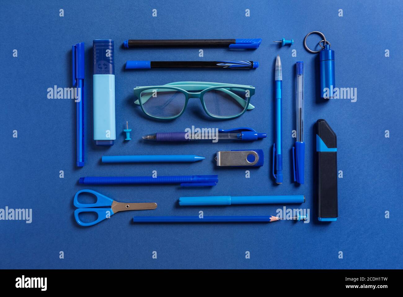 Stationery for school or office on a colored background. Flat Stock