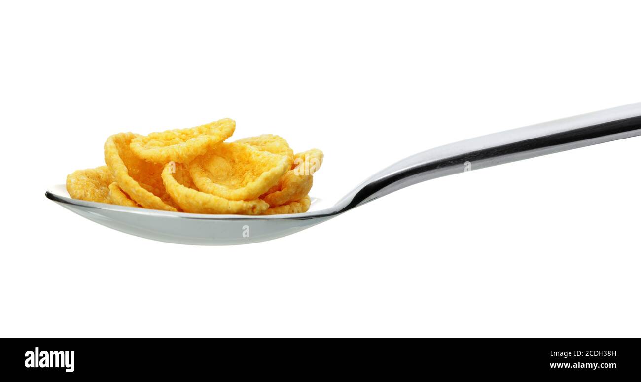 Сornflakes. A dry breakfast in a spoon. Stock Photo