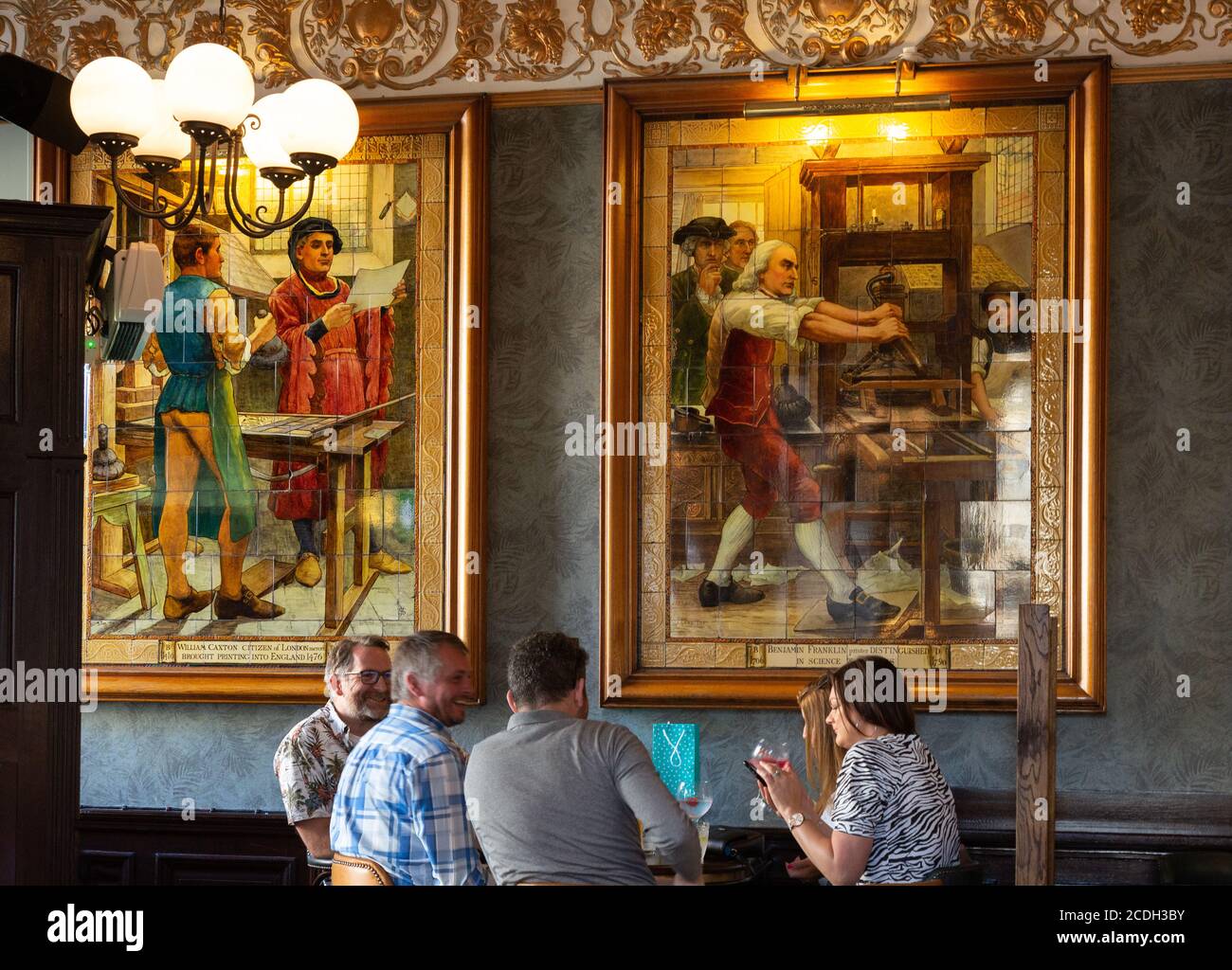 The Cafe Royal Circle Bar, Edinburgh people eating and drinking in the ornate tiled interior