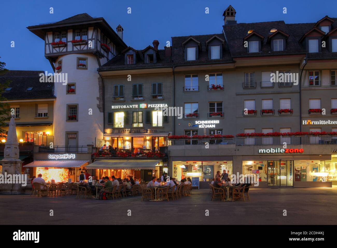 BERN, SWITZERLAND - JUNE 23: Historic houses in Barenplatz, the focal point of Swiss capital city - Bern. The square lies along the ancient city wall, Stock Photo
