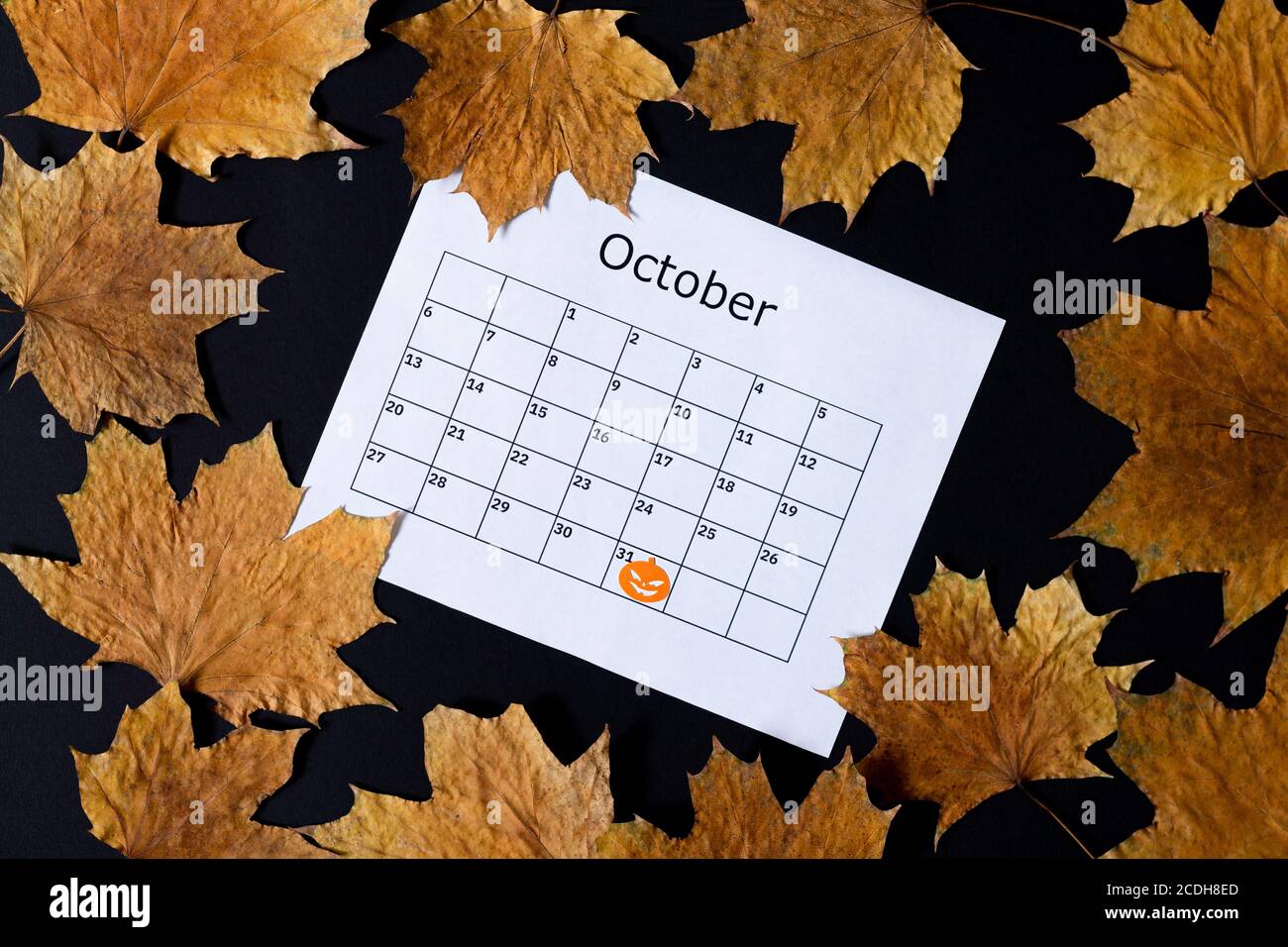 Halloween background. Calendar page with mark on October 31 and fall on ...
