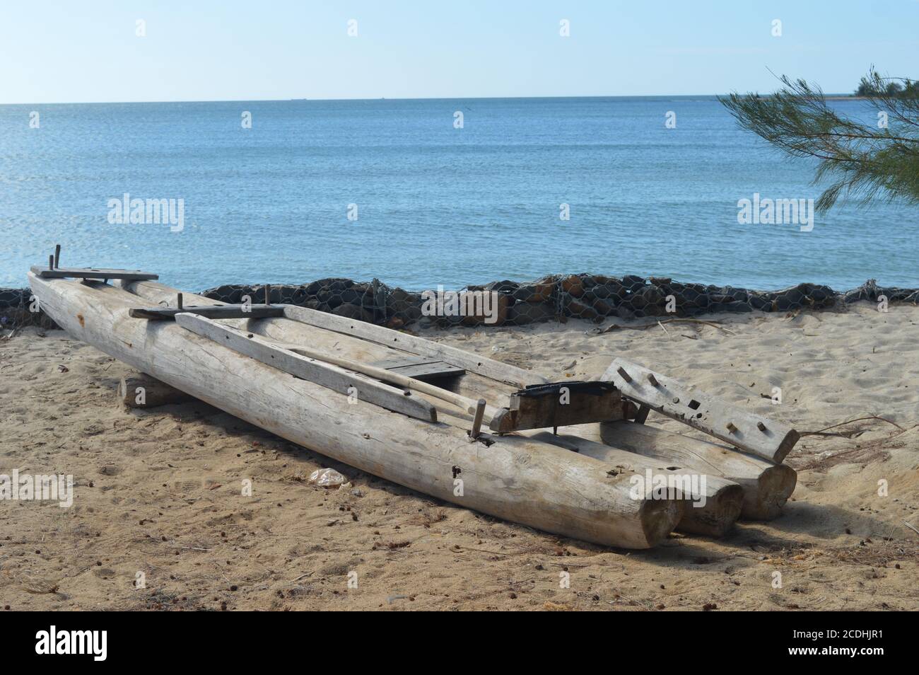 Wooden boat on the sea coast. Fishing boat on the beach Stock Photo - Alamy