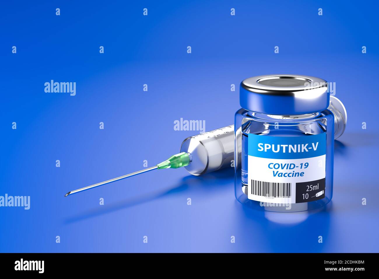 Sputnik V vaccination against COVID-19: A glass container with 10 doses of vaccination and a syringe behind it. Copy space. Stock Photo