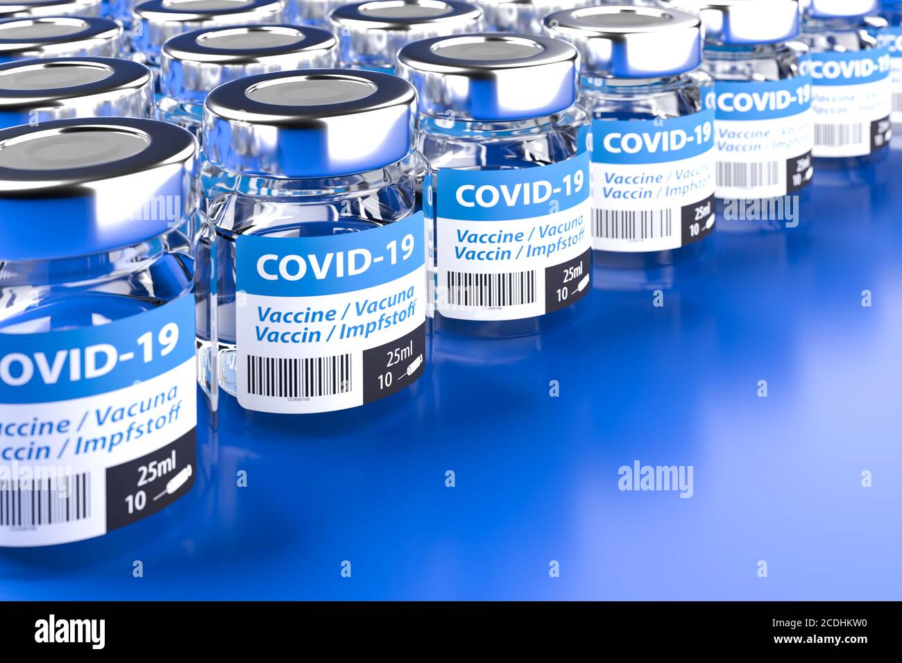 Concept for availability of enough vaccine against Covid-19: Rows of bottles of vaccination. The word vaccination in English, Spanish, French and Germ Stock Photo