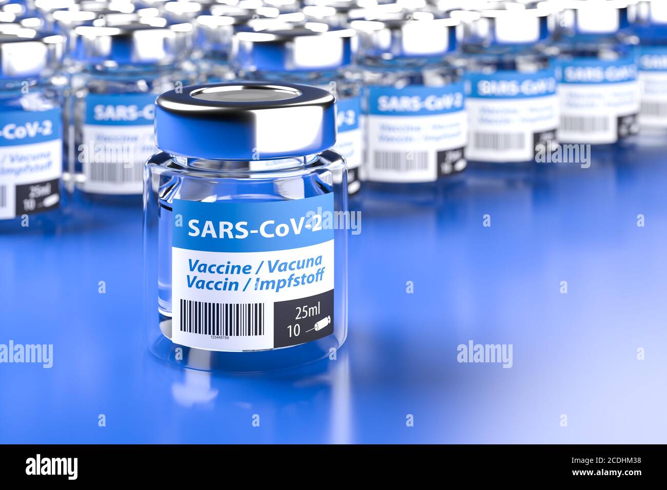 Concept for availability of enough vaccine against new Corona Virus SARS-CoV-2: Bottles of vaccination. The word vaccination in English, Spanish, Fren Stock Photo
