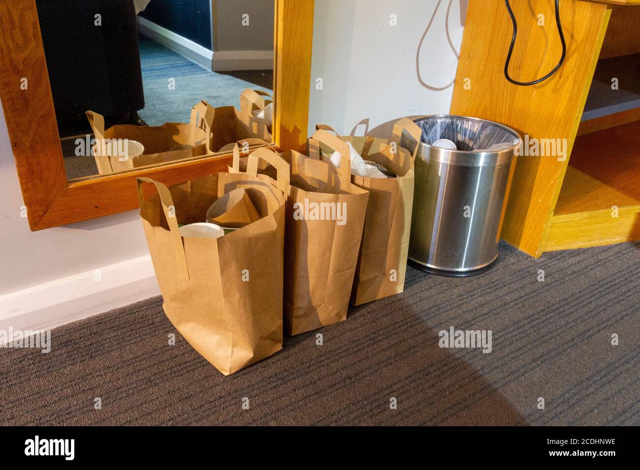 Bags showing increased waste, a side effect of a hotel providing breakfast in bags as part of COVID-19 measures to socially distant, Swindon, UK. Stock Photo