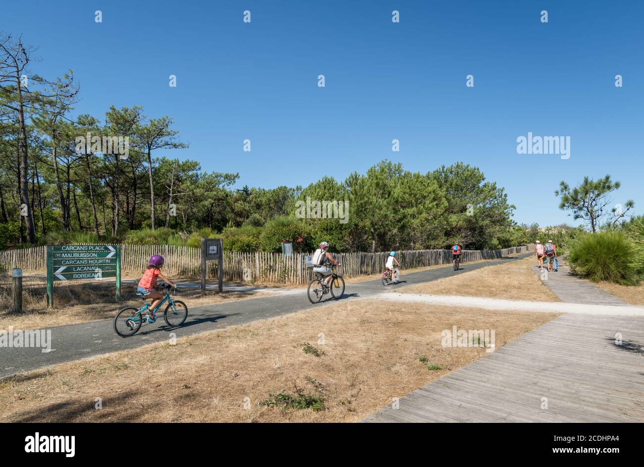 Carcans (Gironde, France), family on the Carcans-Maubuisson cycle path Stock Photo