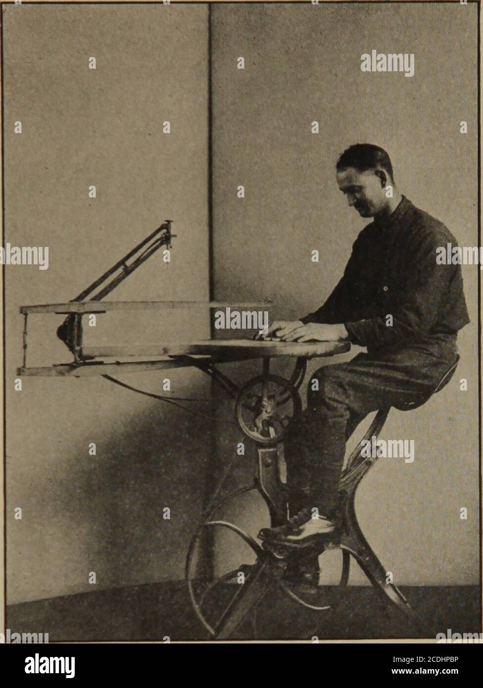 . Occupational therapy applied to restoration of function of disabled joints . Plate 41 Specially adapted machine for long or shortstroke for flexion-extension of knee andankle. Pvt. L. has little movement and isusing short stroke. APPLIED TO RESTORATION OF MOVEMENT 45 III. Wrist. Carpentry: Abduction (and adduction) in hammering withlight hammer, using lathe. Machine shop: No special machine, butvariety of tools. Engraving: Abduction in turning plate, and ad-duction in returning to initial posiion in making curves in work-ing on large unmounted plate, slight abduction in dotting. Hug weav-. P Stock Photo