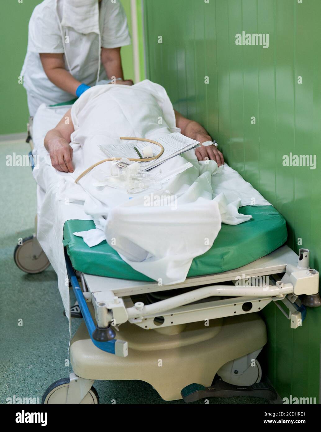 nurse prepares patient for operation Stock Photo
