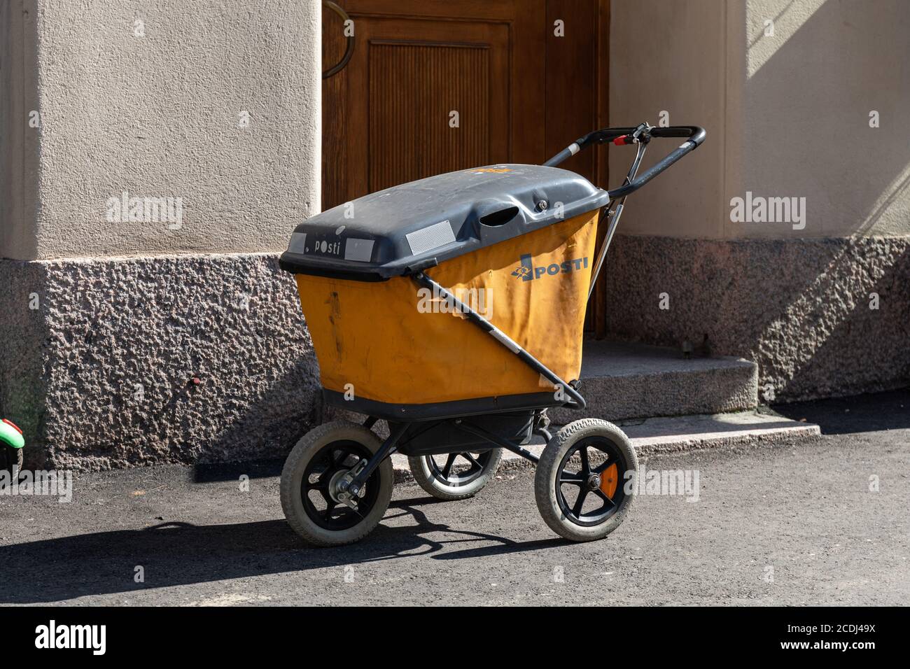 Old school mail carrier cart of Posti Stock Photo