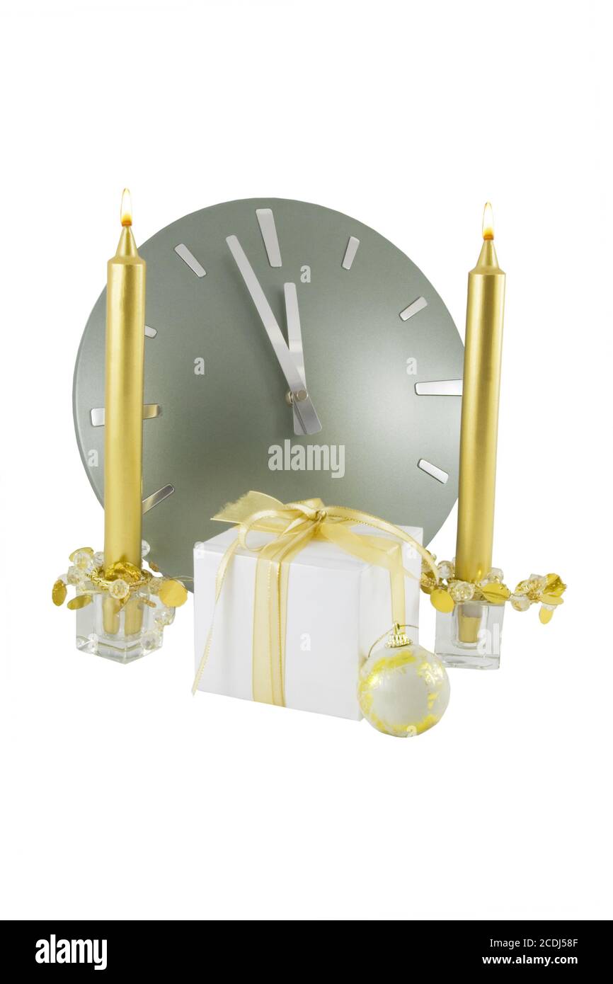 Clock (5 minutes to 12) with christmas  decoration over white Stock Photo