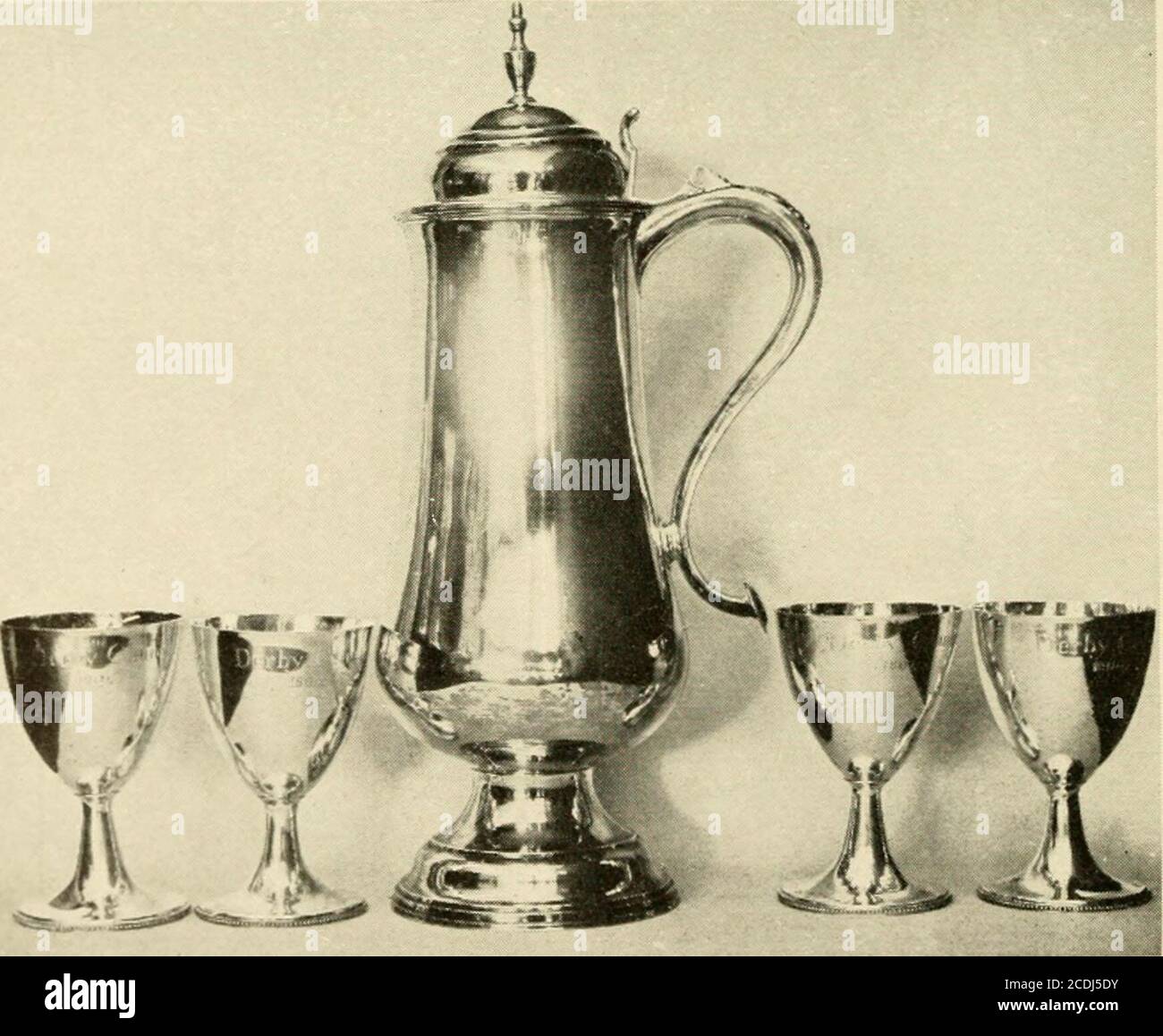 . Early silver of Connecticut and its makers . Made by Timothy Bontecou. Height SY2 inches. Owned byMrs. Oliver Swan, Meriden. Mark: T. B. incised. Plate of the First Congregational Church, Derby Flagon, height 17:!i inches. Made by Ebenezer Chittenden. Chalices, height 5% inches. Made by Miles Gorham, 1804 v.  E. Chittenden in rectangle I M. G. in rectangle Plate xvii. EARLY SILVER OF CONNECTICUT AND ITS MAKERS ony, was evidently quite a centre of silver-smithing. The map of 1748 shows thatTimothy Bontecou, also of Huguenot de-scent, was located on the west side of FleetStreet, which ran fro Stock Photo