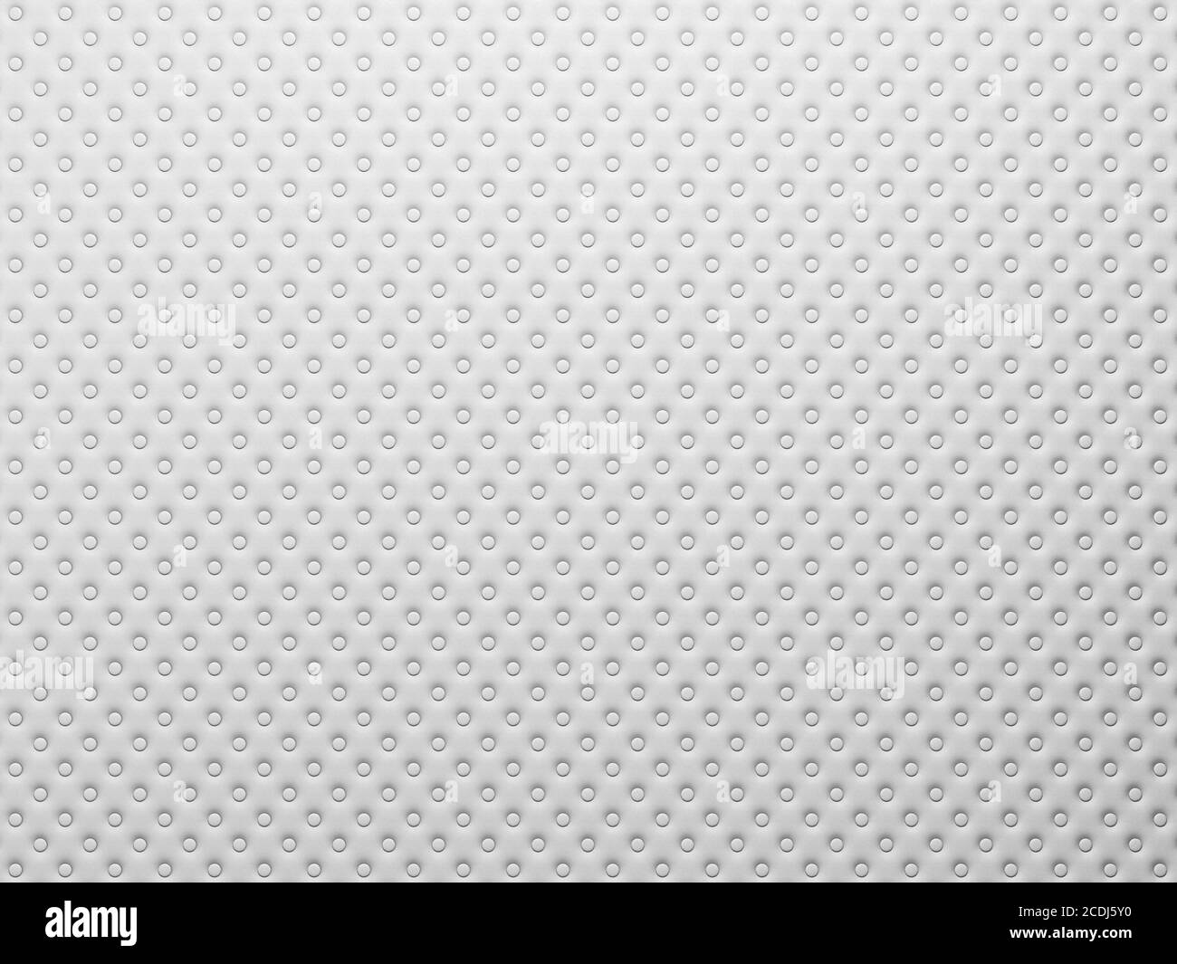 White leather panel with symmetrically arranged buttons. Stock Photo