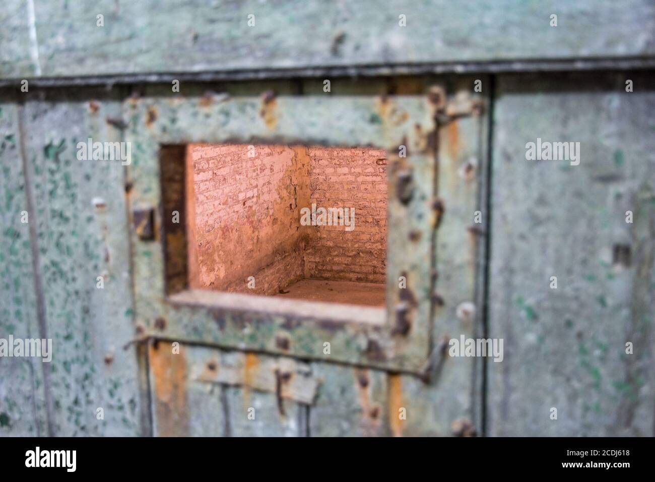 view through prison cell door window abstract photo Stock Photo