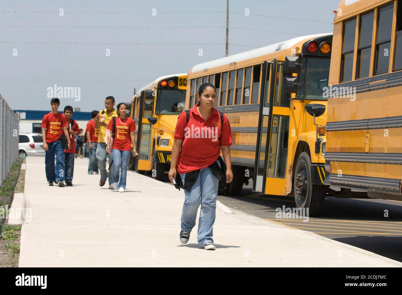 Brownsville, TX USA, April 13, 2007: Sixth and seventh grade students head to school buses at the end of the day at IDEA Public School, a charter public school serving the predominately Hispanic population in far south Texas. ©Bob Daemmrich Stock Photo