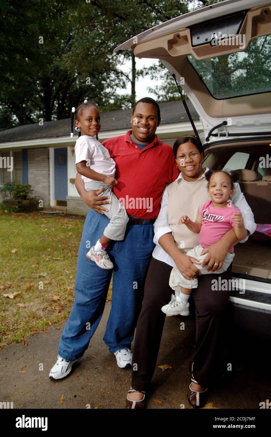 Black family, car and house hires stock photography and images Alamy