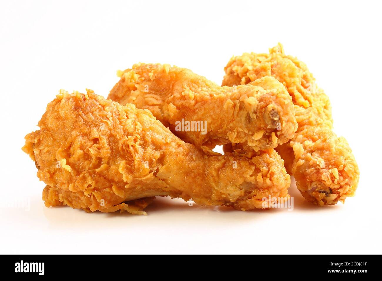 hot and crispy fried chicken legs isolated on a white background Stock Photo