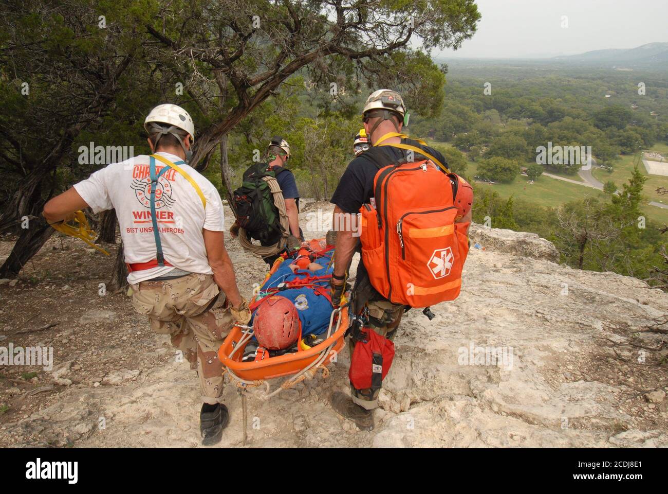 Concan, TX October 7, 2006: Professional fire rescue teams from throughout Texas practice vertical rescues in competitions at Garner State Park in Uvalde County, TX. The annual meet gives firefighters the chance to practice new techniques in non-life threating situations.        ©Bob Daemmrich Stock Photo