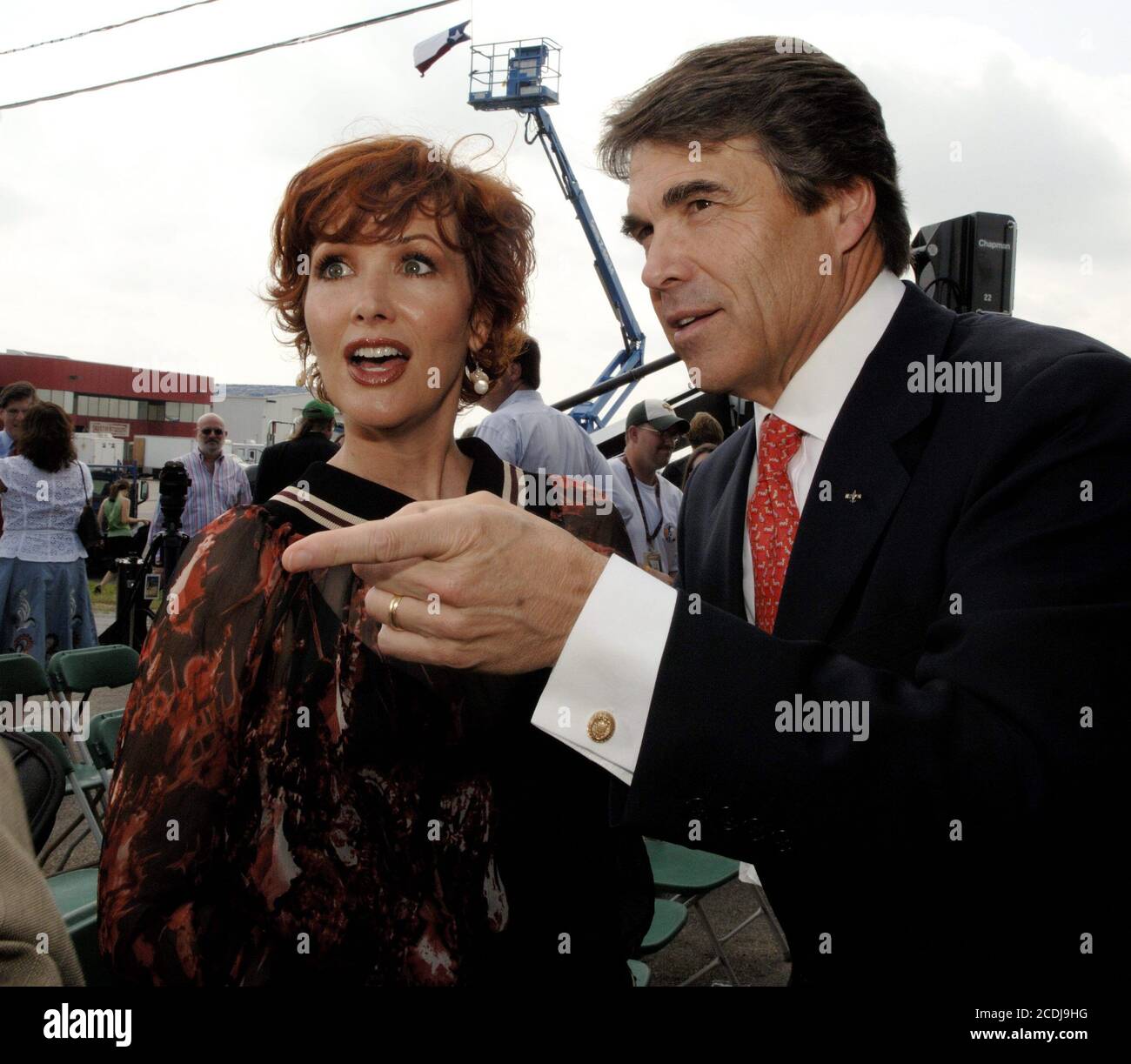 Austin, TX June 7, 2007:  Actress Janine Turner (l) known for her role in 'Northern Exposure'  joins Texas Governor Rick Perry (l) at Austin Studios as Perry signed a bill that that gives $22 million in incentives for the film industry to locate productions in Texas. ©Bob Daemmrich Stock Photo