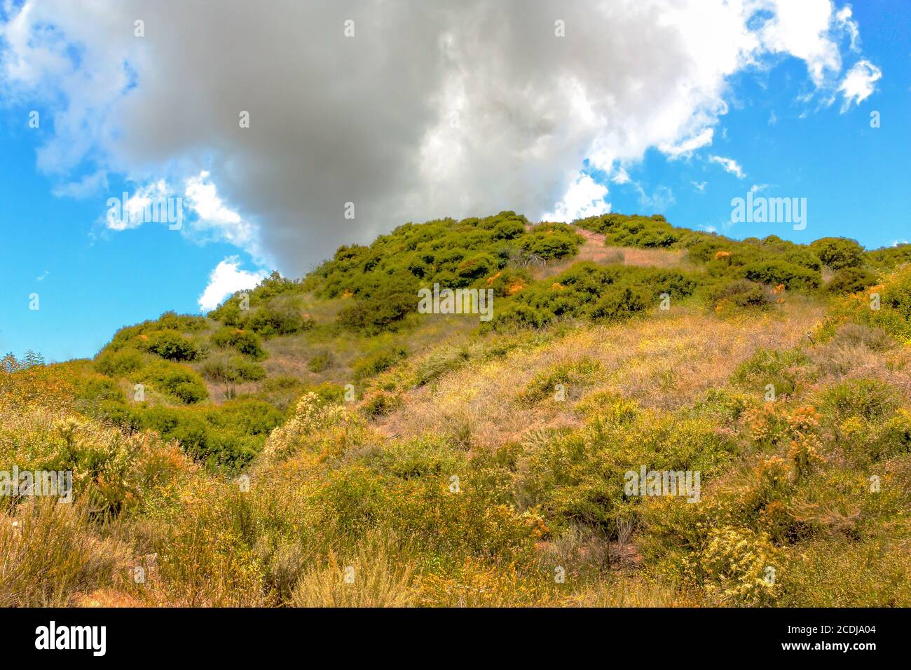 Clouds passing over mountain hi-res stock photography and images - Alamy