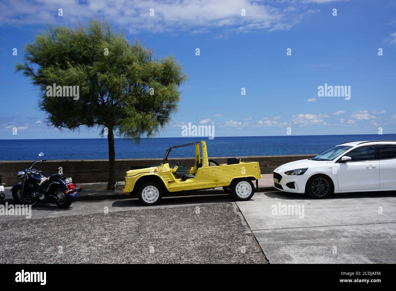 Roadside parking vehicles on the island São Miguel, Azores, Portugal, Europe Stock Photo