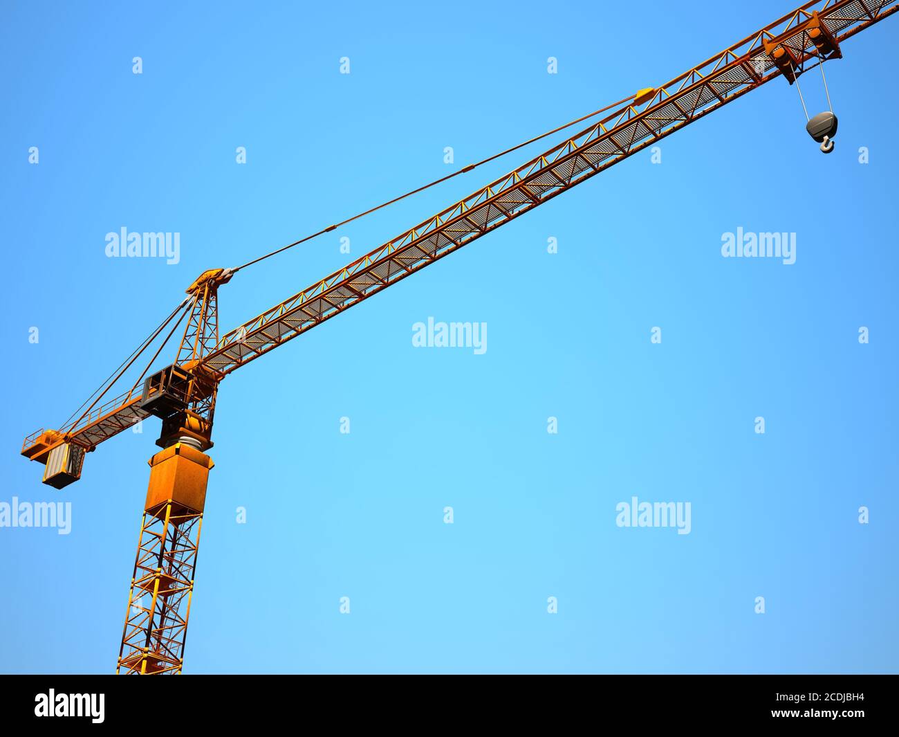 crane and blue sky background Stock Photo - Alamy