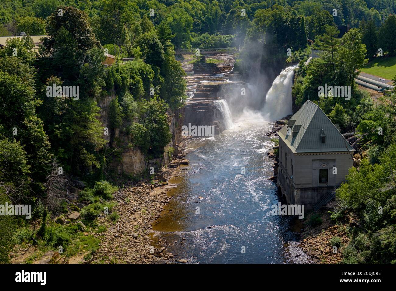 Summer veiw of Rainbow Falls and hydro electric building, Ausable River, Ausable Chasm, New York Stock Photo
