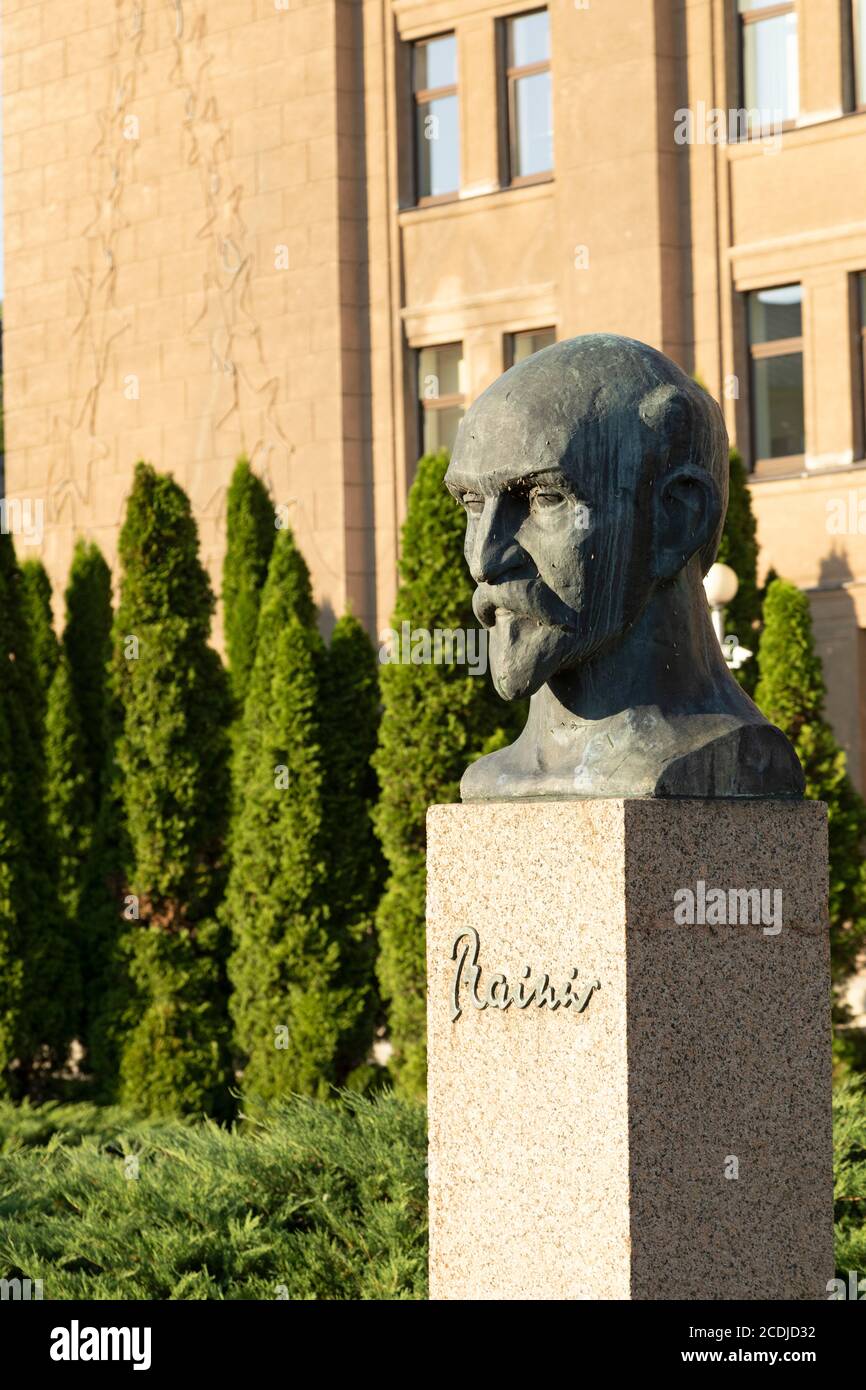 Statue of Rainis, a celebrated Latvia poet, outside of Daugavpils University in Daugavpils, Latvia. Rainis was a pseudonym for Jānis Pliekšāns (1865-1 Stock Photo