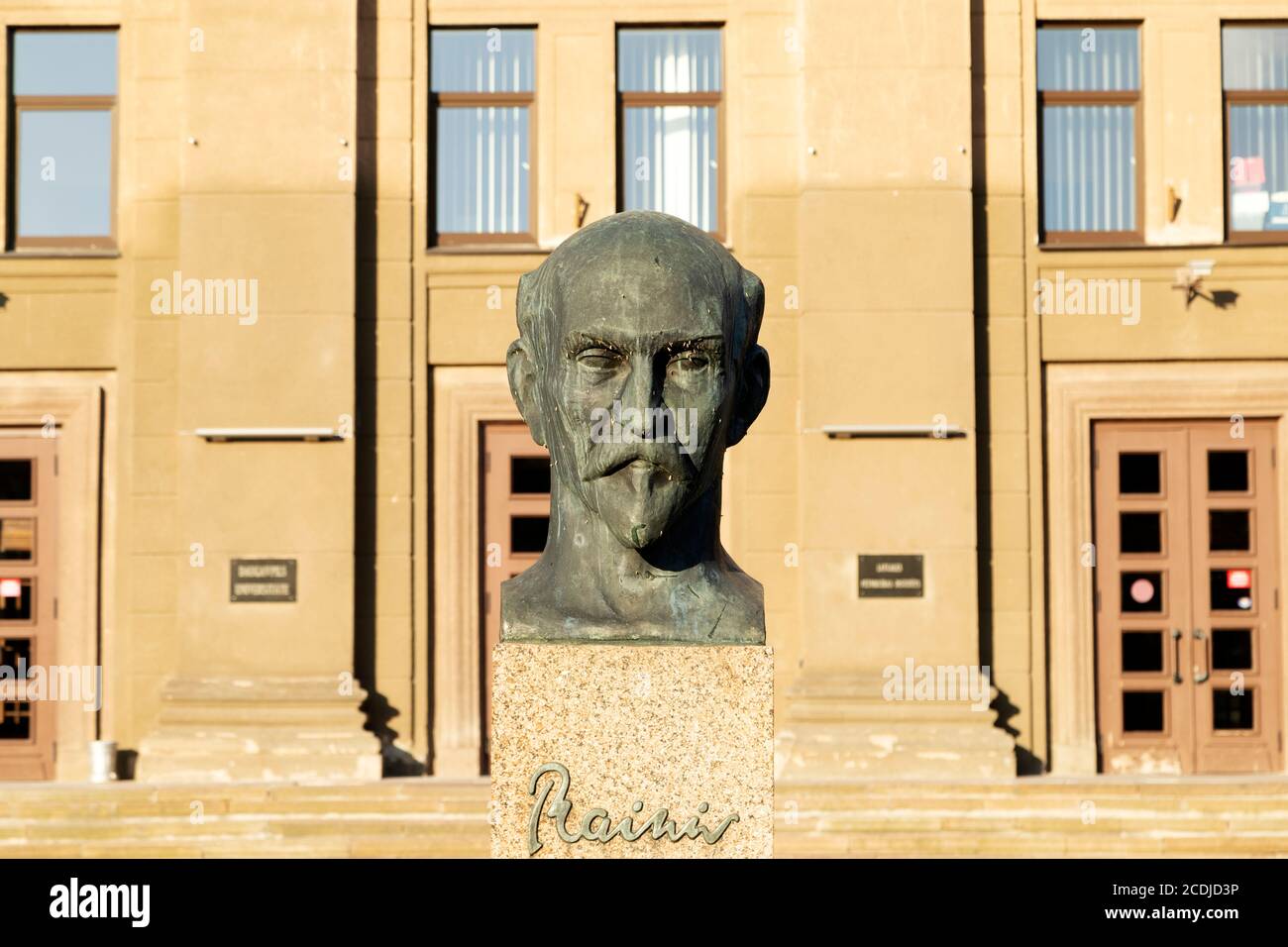 Statue of Rainis, a celebrated Latvia poet, outside of Daugavpils University in Daugavpils, Latvia. Rainis was a pseudonym for Jānis Pliekšāns (1865-1 Stock Photo